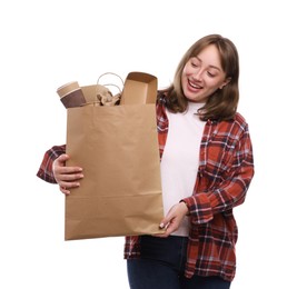 Photo of Recycling. Smiling woman with bag full of different waste paper on white background