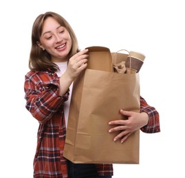 Photo of Recycling. Smiling woman with bag full of different waste paper on white background