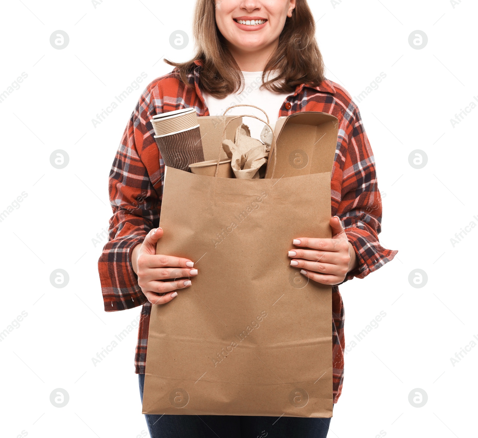 Photo of Recycling. Woman with bag full of different waste paper on white background, closeup