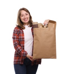 Photo of Recycling. Smiling woman with bag full of different waste paper on white background