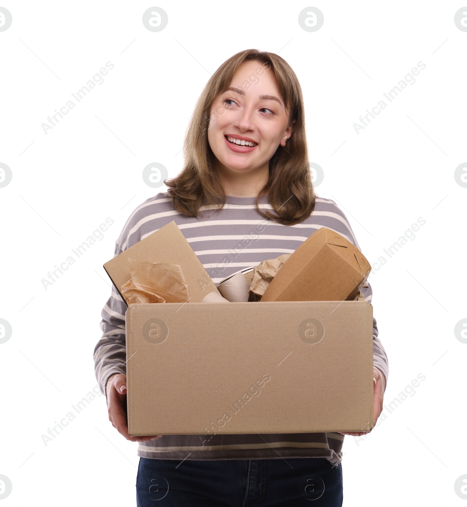 Photo of Recycling. Smiling woman holding cardboard box with different waste paper on white background