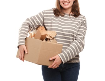 Photo of Recycling. Woman holding cardboard box with different waste paper on white background, closeup