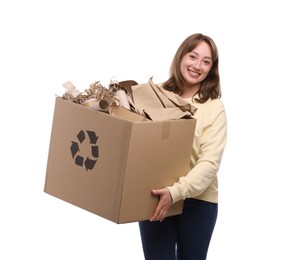 Photo of Recycling. Smiling woman holding cardboard box with different waste paper on white background