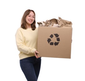 Photo of Recycling. Smiling woman holding cardboard box with different waste paper on white background