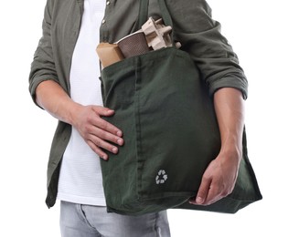 Photo of Recycling. Man with bag full of different waste paper on white background, closeup