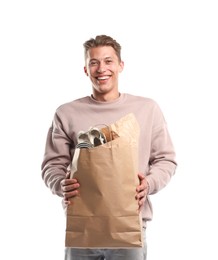 Photo of Recycling. Smiling man with bag full of different waste paper on white background