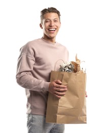 Photo of Recycling. Smiling man with bag full of different waste paper on white background