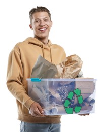 Photo of Recycling. Smiling man holding plastic box with different waste paper on white background