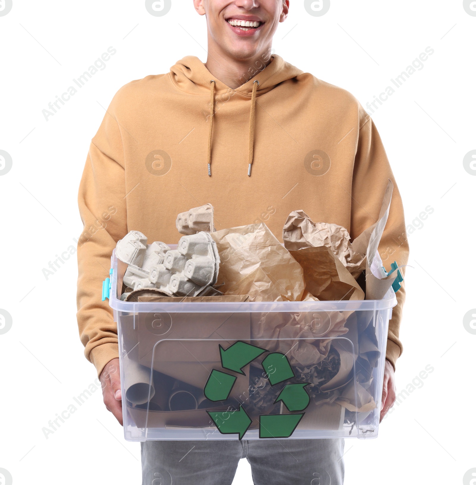 Photo of Recycling. Man holding plastic box with different waste paper on white background, closeup