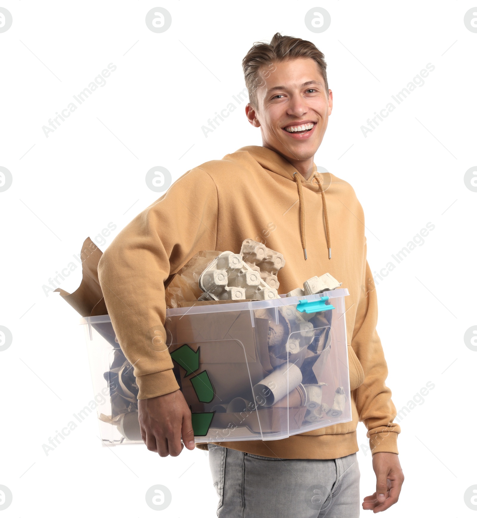 Recycling. Smiling man holding plastic box with different waste paper on white background Photo of Recycling. Smiling man holding plastic box with different waste paper on white background