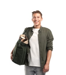 Photo of Recycling. Smiling man with bag full of different waste paper on white background