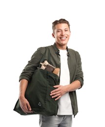 Photo of Recycling. Smiling man with bag full of different waste paper on white background