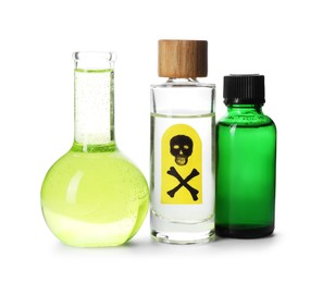 Photo of Bottles of poisons with warning sign isolated on white