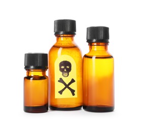Photo of Bottles of poisons with warning sign isolated on white