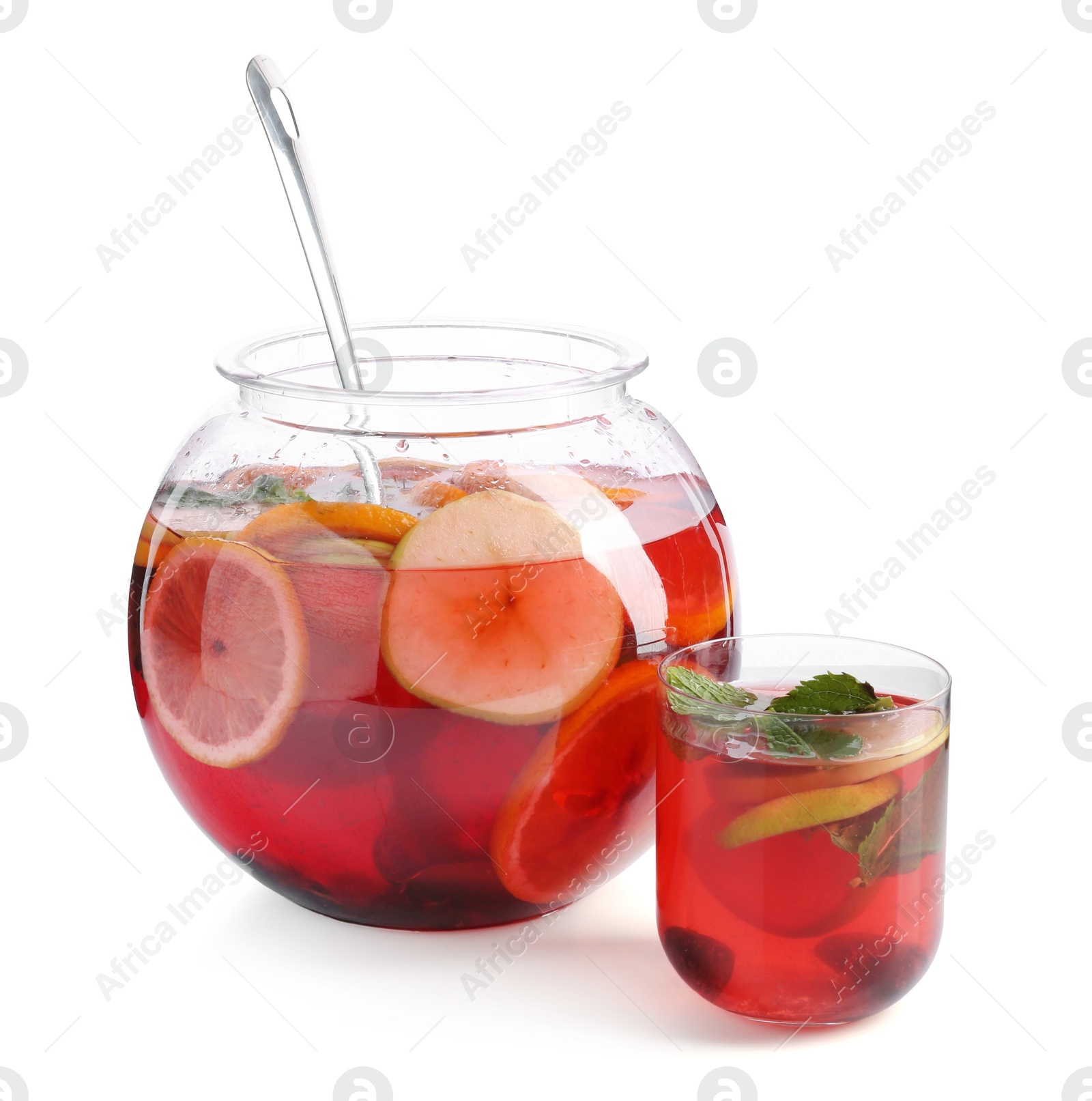 Fruity punch isolated on white. Refreshing drink Photo of Fruity punch isolated on white. Refreshing drink