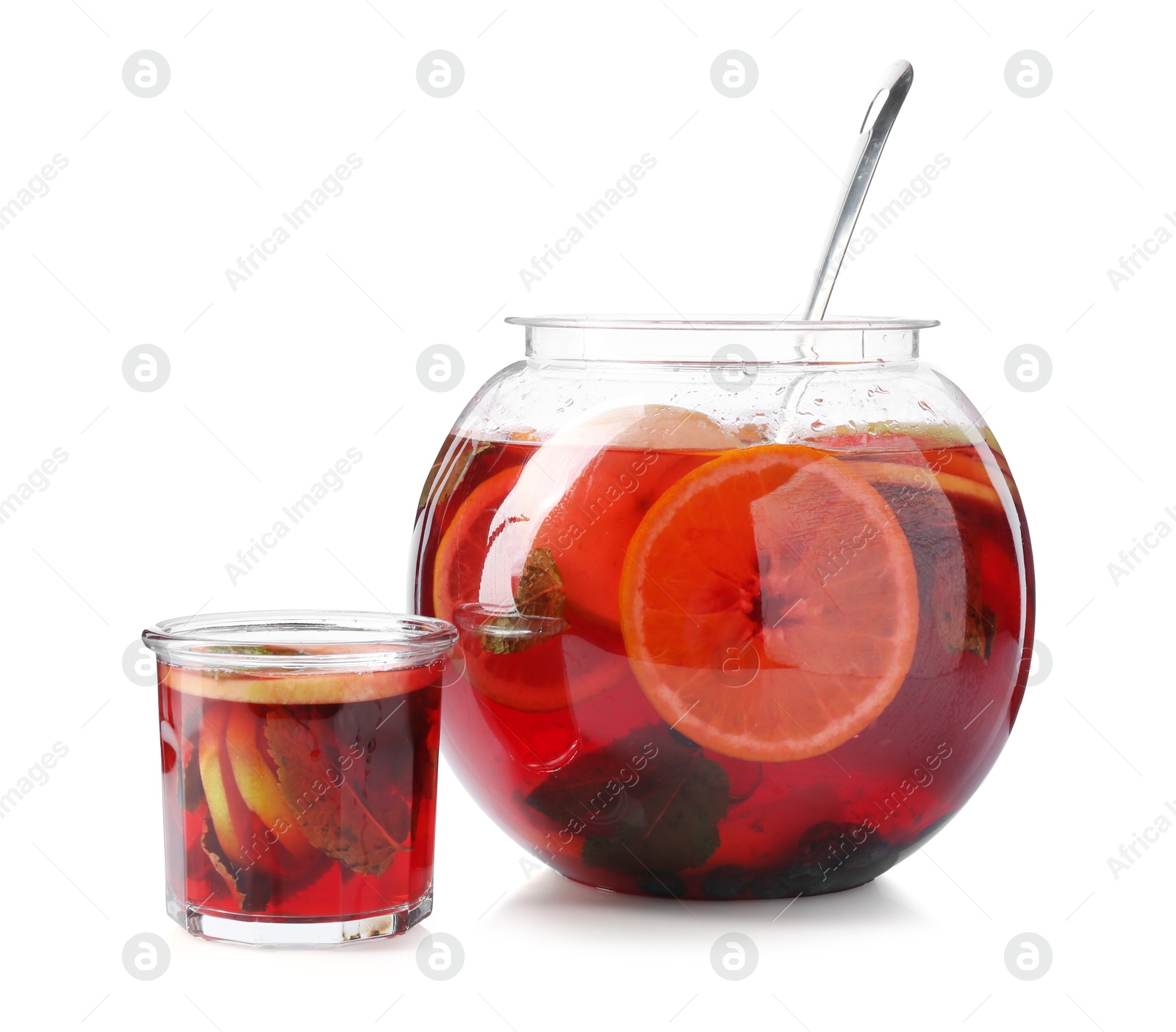 Fruity punch isolated on white. Refreshing drink Photo of Fruity punch isolated on white. Refreshing drink
