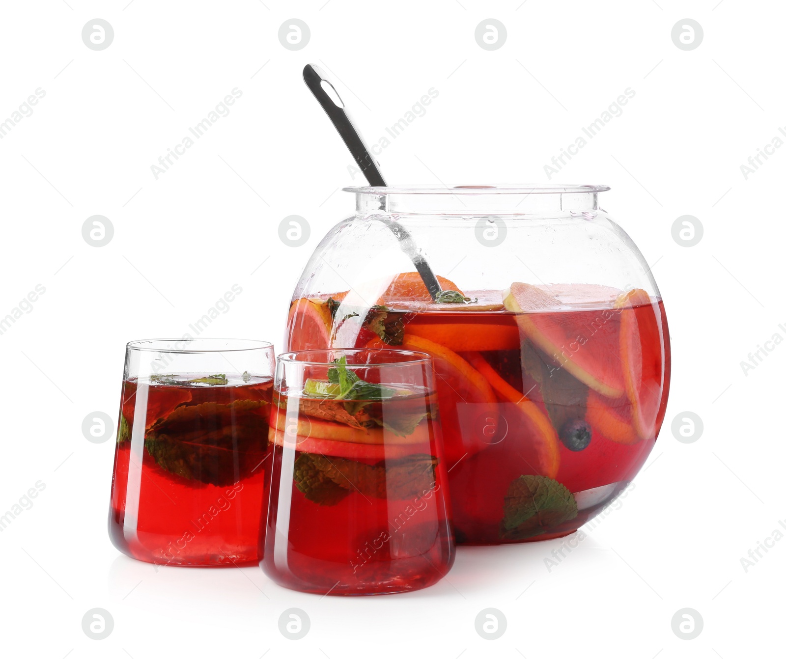 Fruity punch isolated on white. Refreshing drink Photo of Fruity punch isolated on white. Refreshing drink
