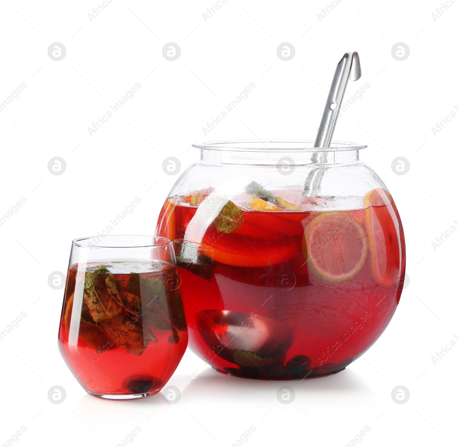 Fruity punch isolated on white. Refreshing drink Photo of Fruity punch isolated on white. Refreshing drink