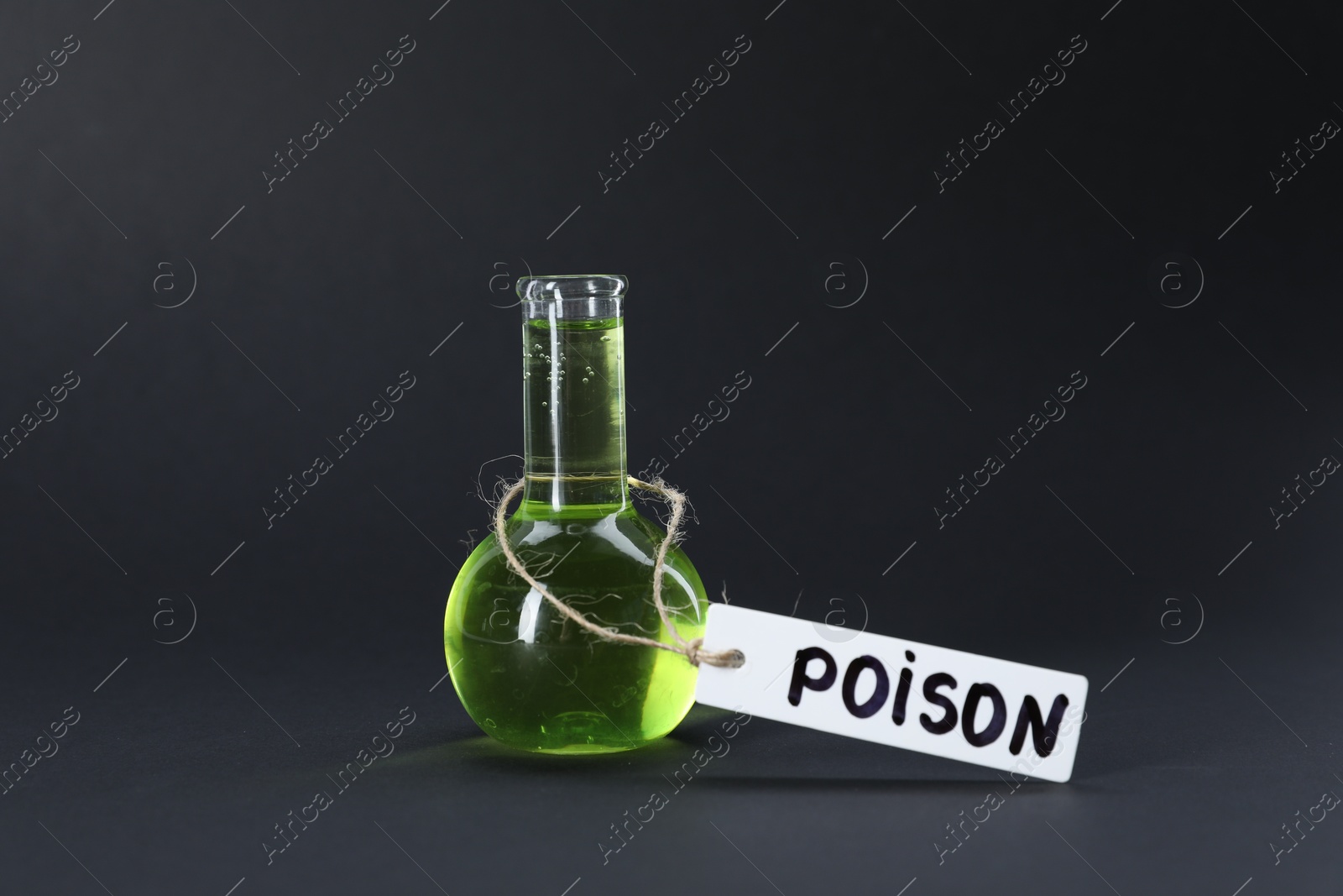 One flask with poison on black background Photo of One flask with poison on black background