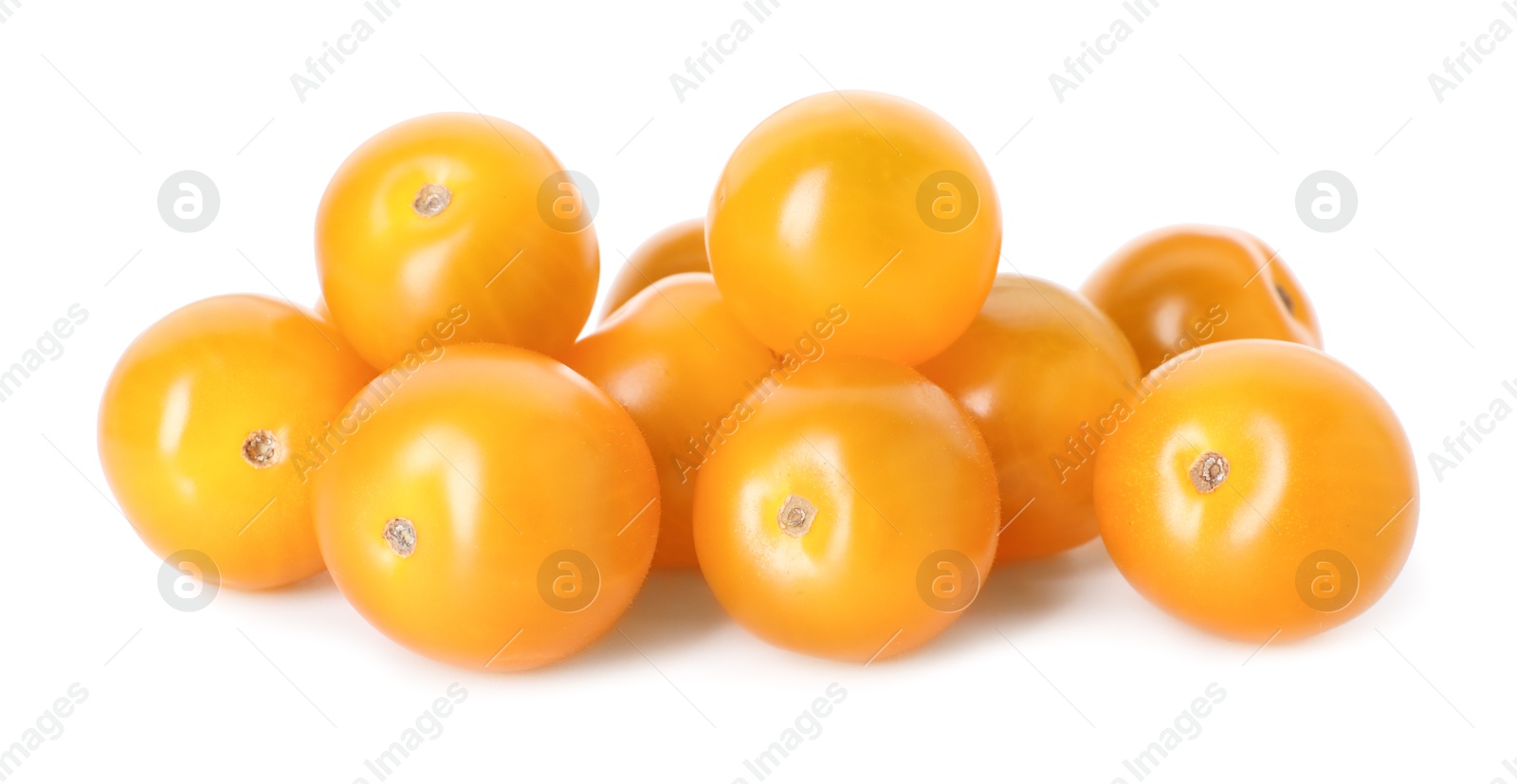 Many ripe yellow tomatoes isolated on white Photo of Many ripe yellow tomatoes isolated on white