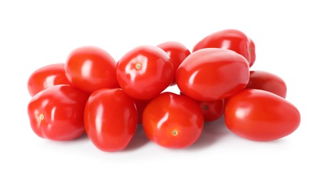 Photo of Many ripe red tomatoes isolated on white
