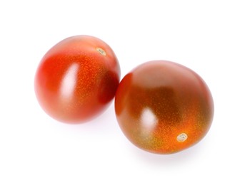 Photo of Two ripe juicy tomatoes isolated on white