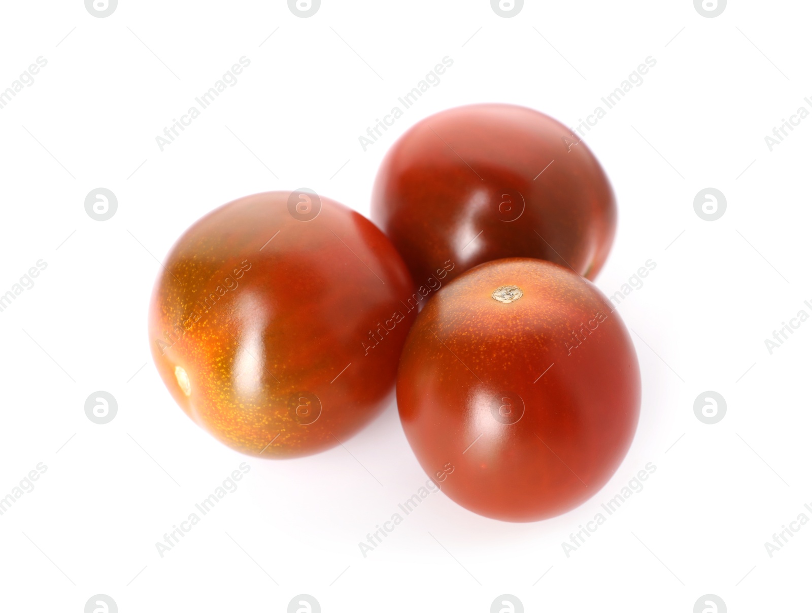 Three ripe juicy tomatoes isolated on white Photo of Three ripe juicy tomatoes isolated on white