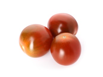 Photo of Three ripe juicy tomatoes isolated on white