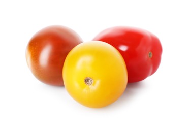 Photo of Different ripe juicy tomatoes isolated on white