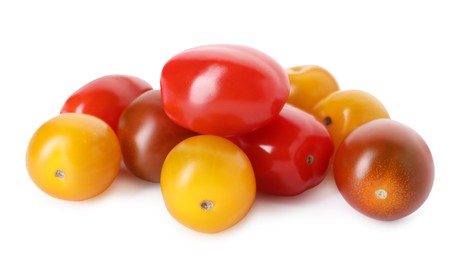 Photo of Different ripe juicy tomatoes isolated on white
