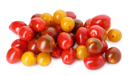 Photo of Heap of different ripe juicy tomatoes isolated on white