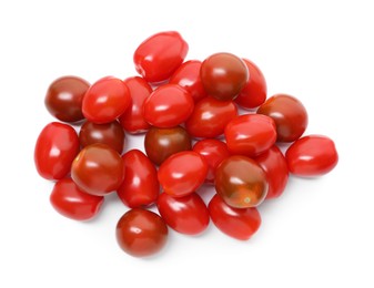 Photo of Heap of different ripe juicy tomatoes isolated on white, top view