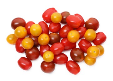 Photo of Heap of different ripe juicy tomatoes isolated on white, top view