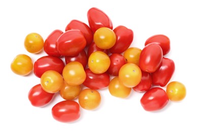 Photo of Heap of different ripe juicy tomatoes isolated on white, top view