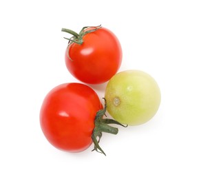 Photo of Different ripe juicy tomatoes isolated on white, top view