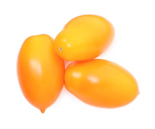 Photo of Ripe yellow tomatoes isolated on white, top view