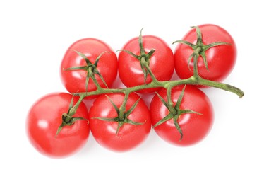 Photo of Branch of ripe red tomatoes isolated on white, top view