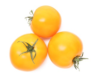 Photo of Ripe yellow tomatoes isolated on white, top view