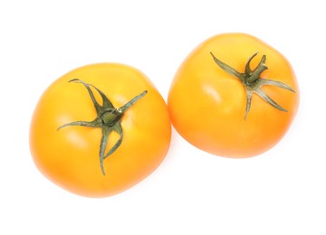 Photo of Ripe yellow tomatoes isolated on white, top view