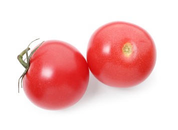 Photo of Ripe red tomatoes isolated on white, top view