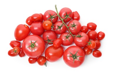 Photo of Many ripe red tomatoes isolated on white, top view
