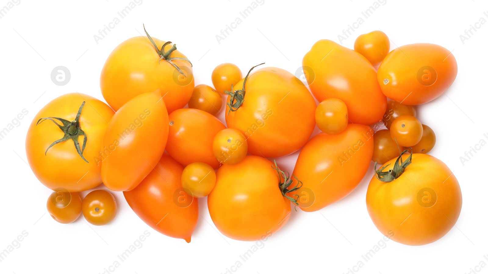 Photo of Many ripe yellow tomatoes isolated on white, top view