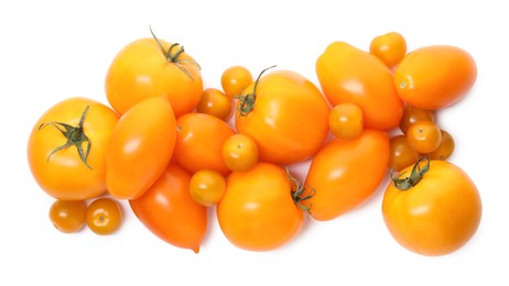 Photo of Many ripe yellow tomatoes isolated on white, top view