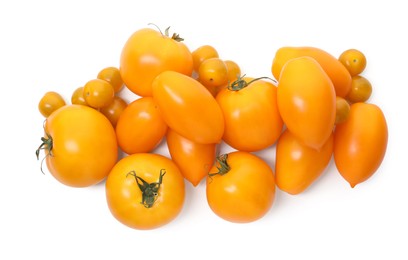 Photo of Many ripe yellow tomatoes isolated on white, top view