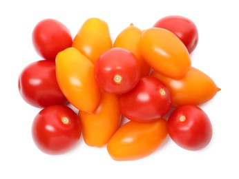 Photo of Heap of different ripe juicy tomatoes isolated on white, top view