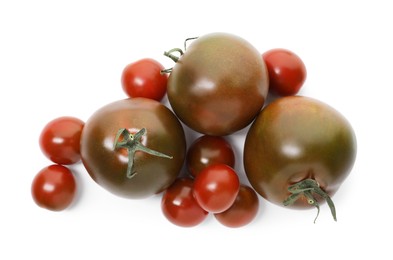 Photo of Different ripe juicy tomatoes isolated on white, top view