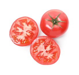 Photo of Whole and cut red tomatoes isolated on white, top view