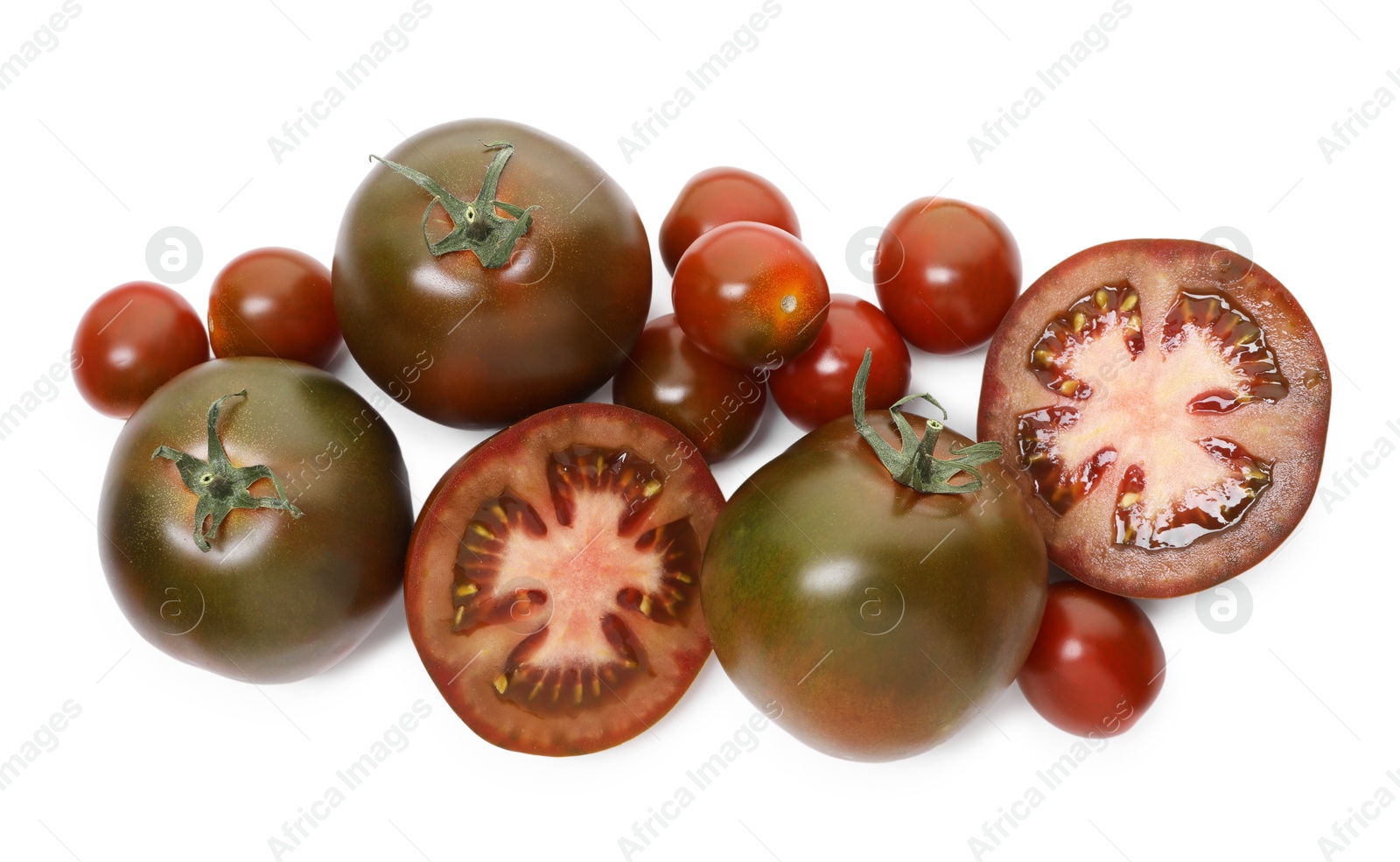 Photo of Ripe brown tomatoes isolated on white, top view