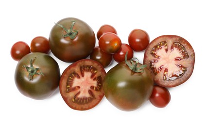 Photo of Ripe brown tomatoes isolated on white, top view