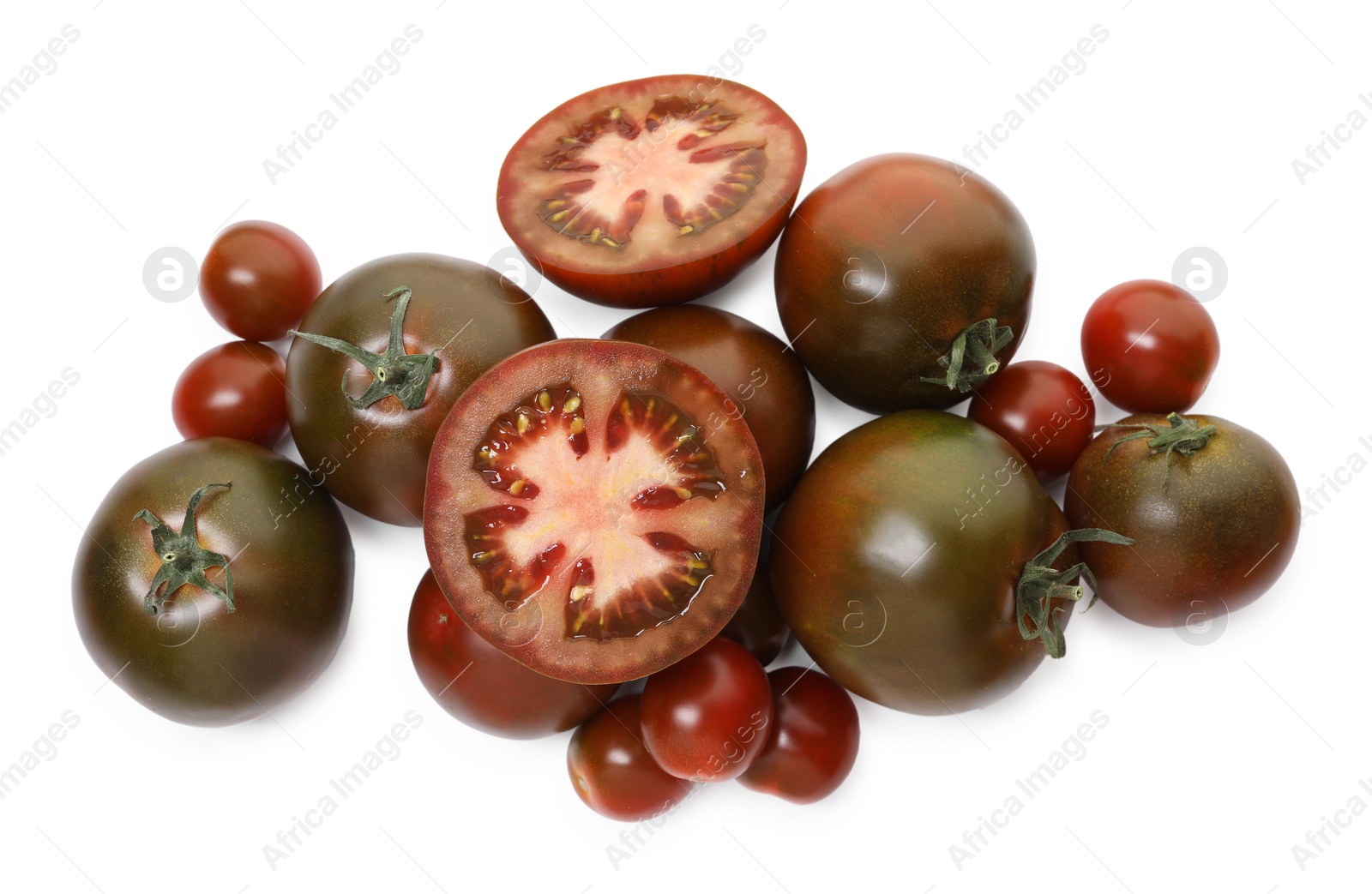 Photo of Ripe brown tomatoes isolated on white, top view